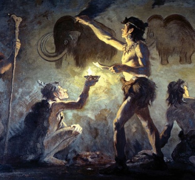 Paleolithic men paint  inside a cave