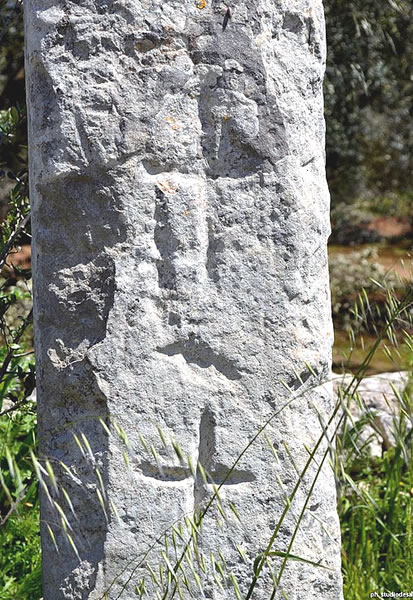 Engraved crosses on a menhir