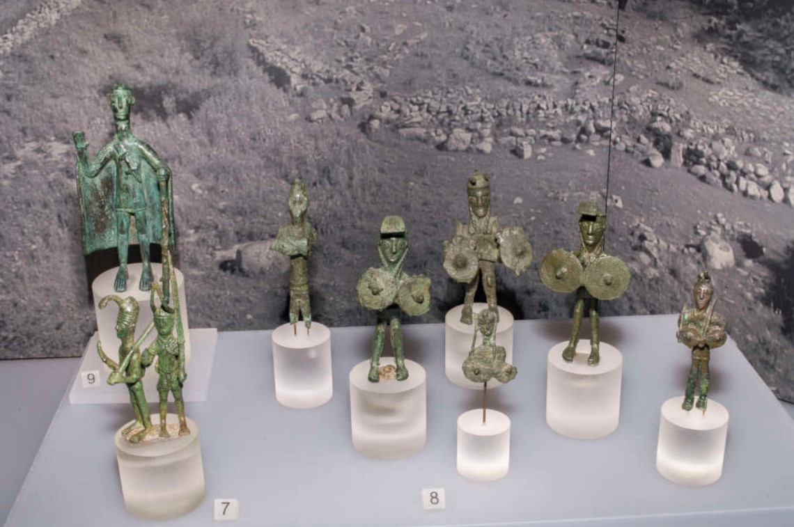 Group of bronzes (X-VII century BC) coming from Abini and depicting characters of the nuragic community: soldiers in pairs caught in the act of prayer and characterized by helmets surmounted by long horns (7); heroic warriors to which multiply some parts of the body, such as eyes and arms or shields, are exactly similar to those found in the Middle East (8); tribal leaders (9) - (National Archaeological Museum in Cagliari)