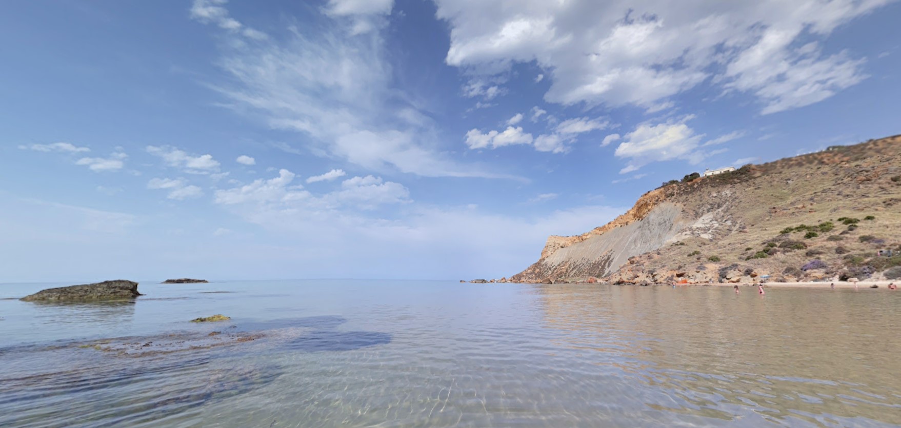 View of Capo Rossello,  the site where the australopithecus remains were found on the top right (Realmonte, Agrigento, Italia)