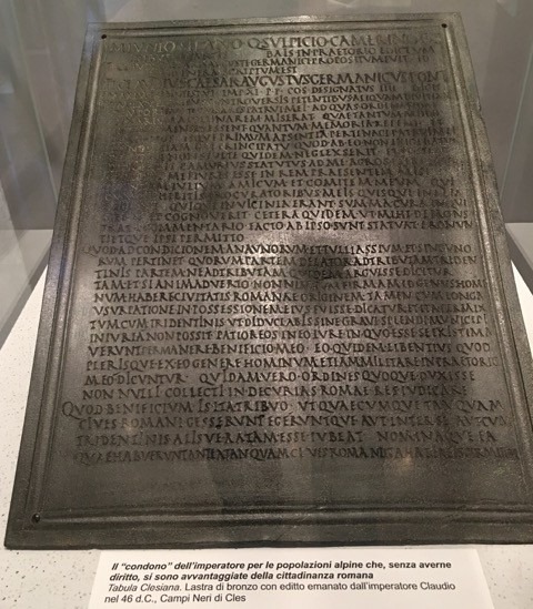 Tabula Clesiana, Castello del Buonconsiglio Museum. Each of the four corners has a hole that allowed the table to be hung in a place that would allow everyone to read it. Two dents are visible in the center, perhaps caused accidentally by digging when it was discovered.