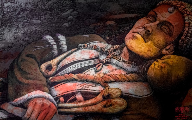 The young prince. Note the reconstructed jaw with yellow ochre and the body covered with red ochre (Archaeological Museum in Finale)